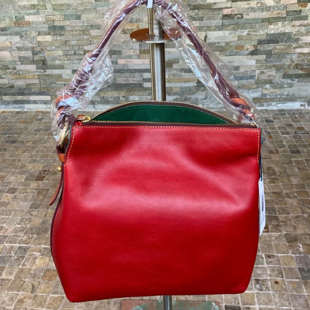 Dooney and bourke New with tags twisted strap Florentine hobo